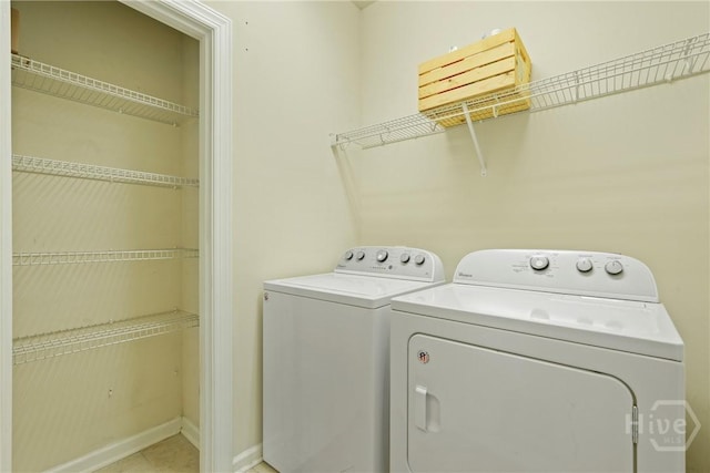 121 Belle Gate Dr, Pooler, GA 31322 - laundry area with washing machine and clothes dryer and baseboards