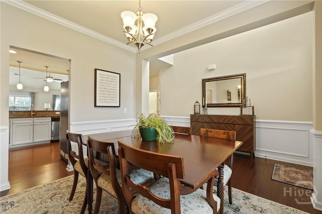 121 Belle Gate Dr, Pooler, GA 31322 - dining space featuring a chandelier, hardwood / wood-style flooring, a wainscoted wall, crown molding, and ceiling fan