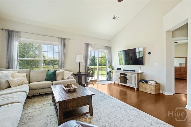 121 Belle Gate Dr, Pooler, GA 31322 - living area featuring dark wood-style flooring and high vaulted ceiling
