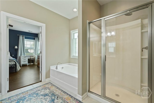 121 Belle Gate Dr, Pooler, GA 31322 - full bath featuring a bath, ensuite bath, a stall shower, and tile patterned floors