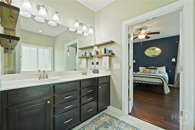 121 Belle Gate Dr, Pooler, GA 31322 - ensuite bathroom featuring a ceiling fan, double vanity, and tile patterned flooring