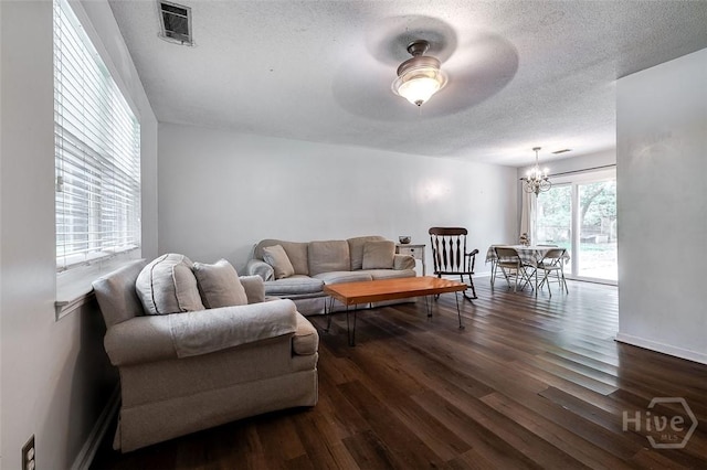 206 Pinecrest Pl, Pooler, GA 31322 - living area featuring a chandelier, dark wood finished floors, ceiling fan, and a textured ceiling