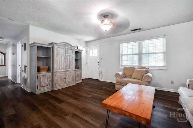 206 Pinecrest Pl, Pooler, GA 31322 - living area featuring dark wood-style flooring, a textured ceiling, and ceiling fan