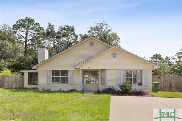 view of front of property with a front lawn