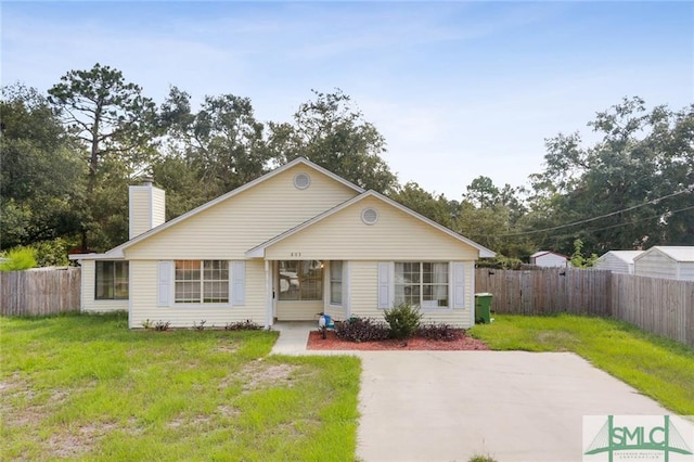 view of front of home with a front lawn