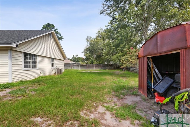 view of yard with central AC