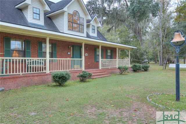 view of front facade with a porch and a front lawn