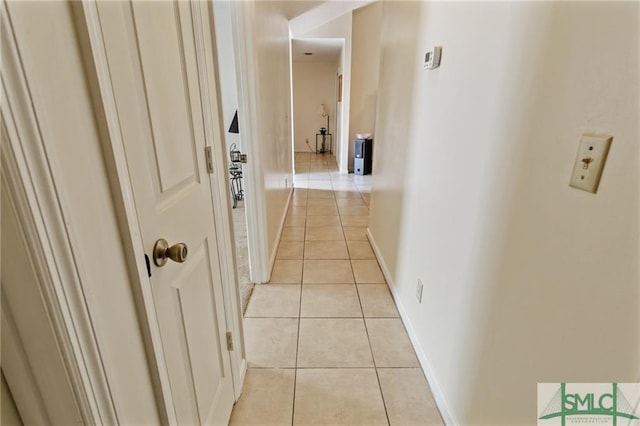 hallway with light tile floors