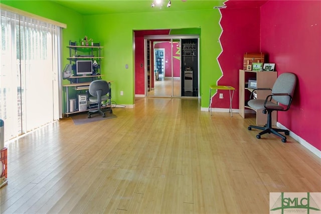 home office featuring light hardwood / wood-style flooring