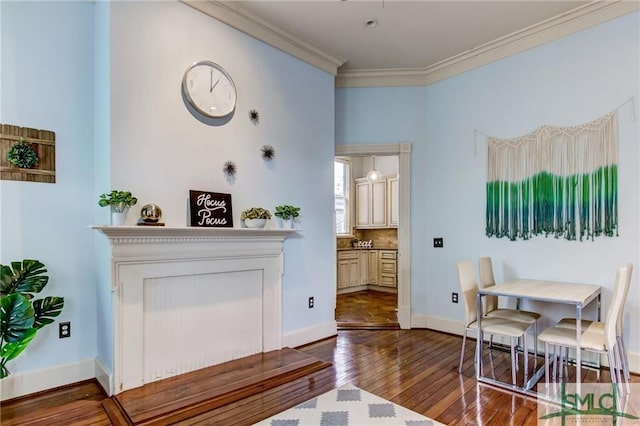 interior space featuring dark hardwood / wood-style flooring and crown molding