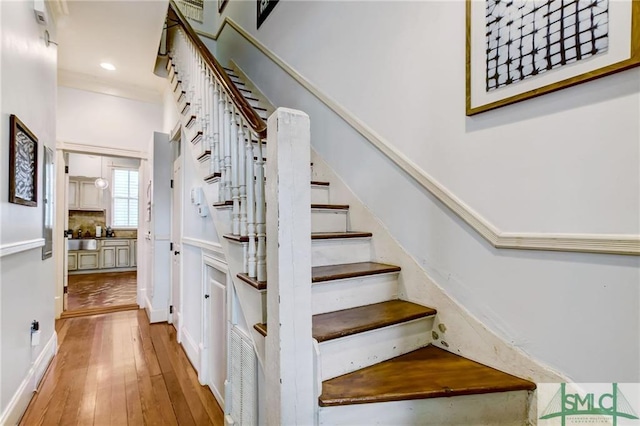 stairs with light wood-type flooring