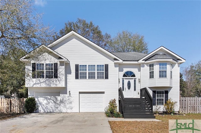 split foyer home featuring a garage