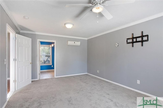 carpeted empty room featuring an AC wall unit, ceiling fan, and ornamental molding