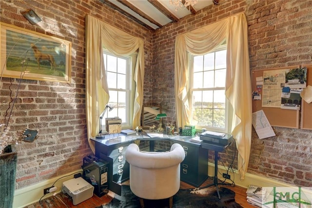 office with brick wall and plenty of natural light