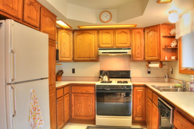 kitchen featuring white appliances, sink, light tile floors, and exhaust hood