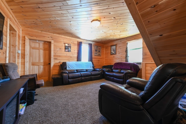 carpeted living room with wooden ceiling and wooden walls