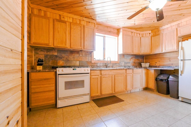 kitchen with ceiling fan, light tile flooring, white appliances, wooden walls, and wood ceiling