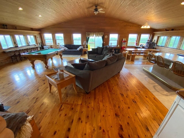 living room featuring lofted ceiling, light wood-type flooring, pool table, and wooden ceiling