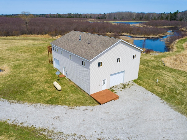 bird's eye view with a water view