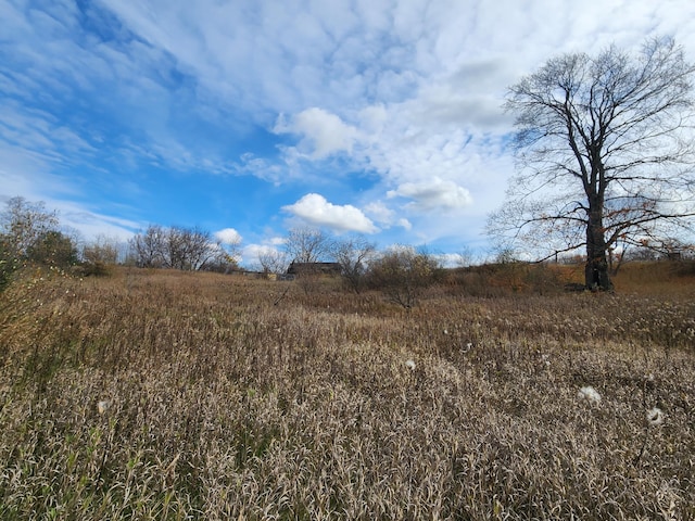 view of landscape featuring a rural view