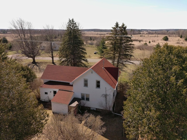 birds eye view of property featuring a rural view