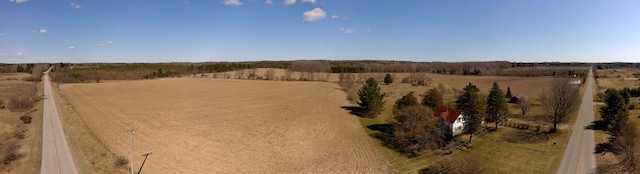 birds eye view of property featuring a rural view