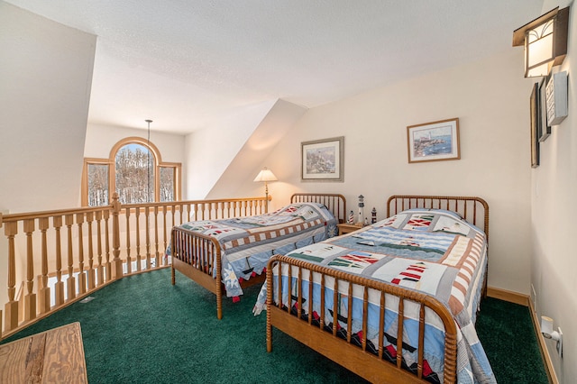 carpeted bedroom featuring a textured ceiling, a notable chandelier, and vaulted ceiling