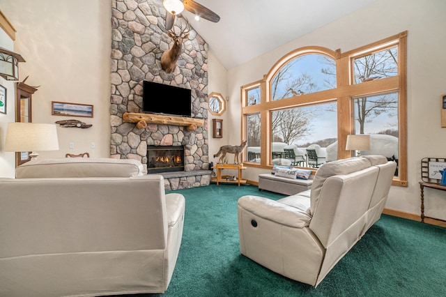 living room featuring a fireplace, high vaulted ceiling, dark colored carpet, and ceiling fan