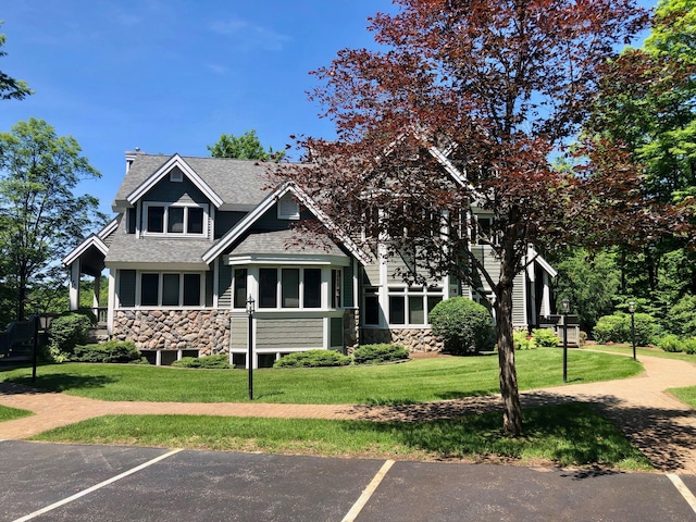 view of front of home with a front yard