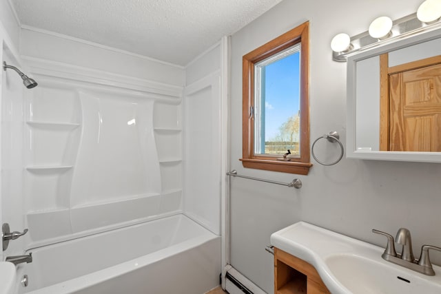 bathroom with vanity, shower / bathtub combination, baseboard heating, and a textured ceiling