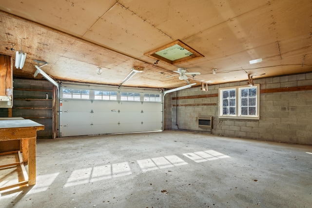 garage featuring heating unit