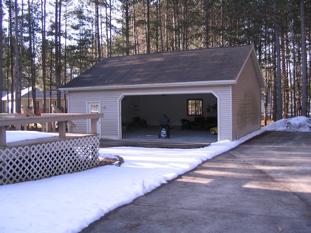 view of snow covered garage