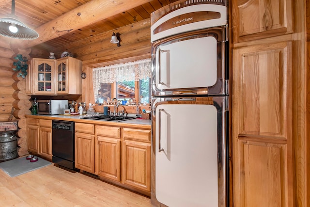 kitchen featuring dishwasher, beamed ceiling, sink, rustic walls, and light hardwood / wood-style floors