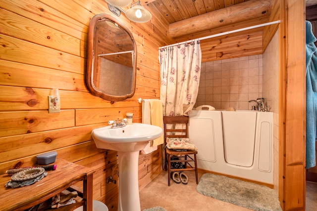 bathroom featuring wood walls, plus walk in shower, and wooden ceiling