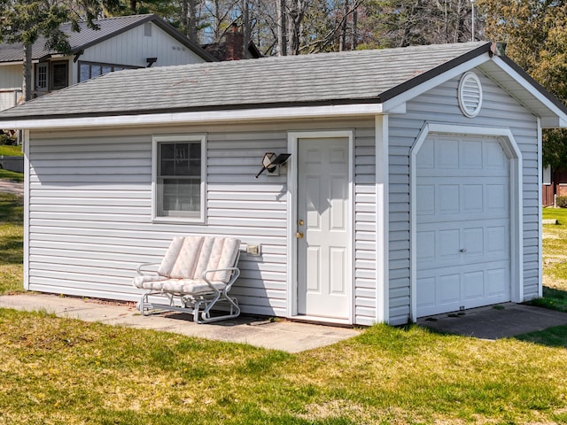 garage with a lawn