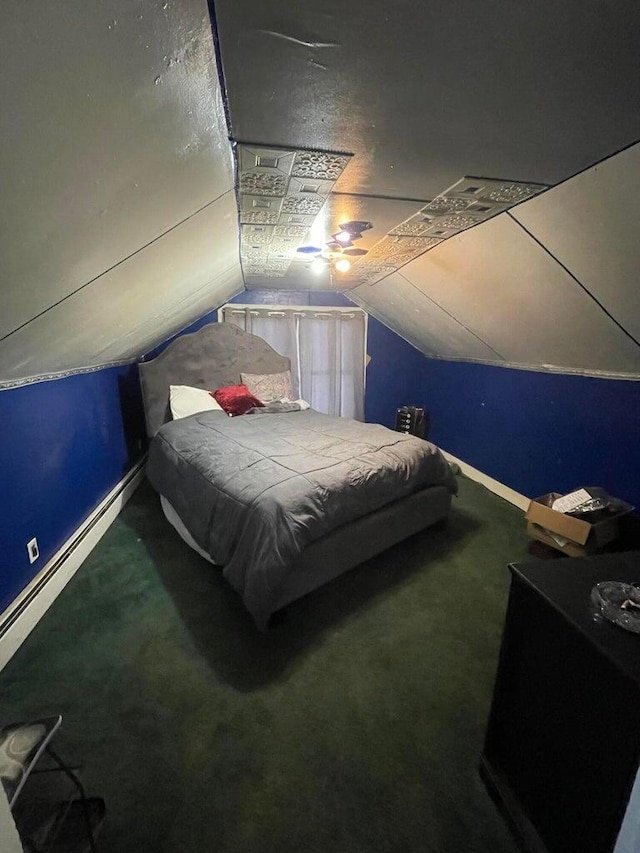 bedroom featuring lofted ceiling and carpet floors