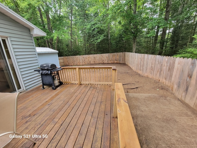 wooden terrace with grilling area