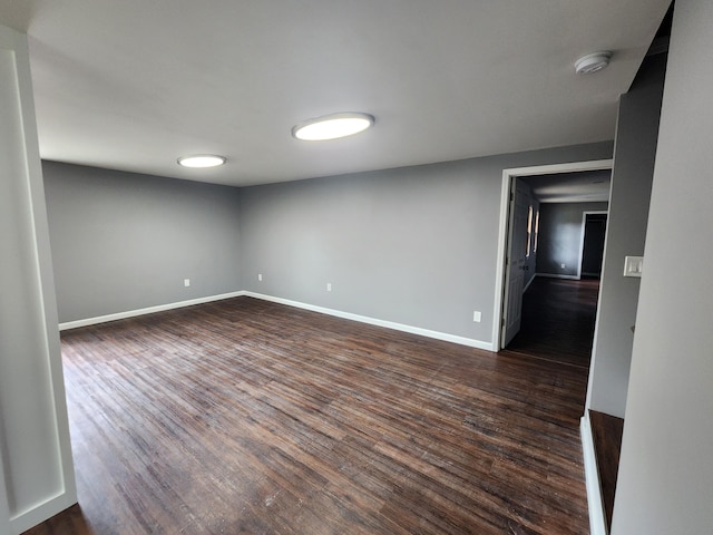 empty room featuring dark hardwood / wood-style floors