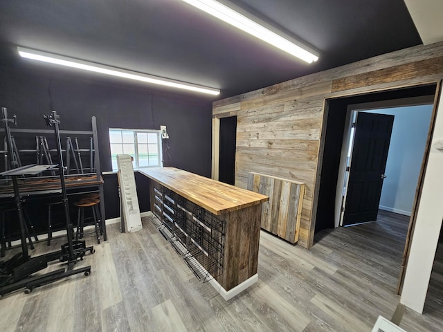 interior space with butcher block countertops and hardwood / wood-style flooring