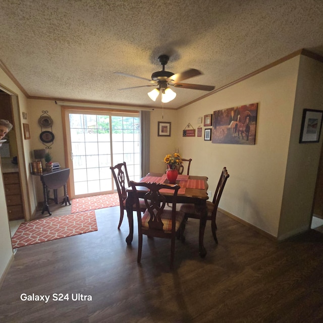 dining space featuring dark hardwood / wood-style floors, ornamental molding, a textured ceiling, and ceiling fan