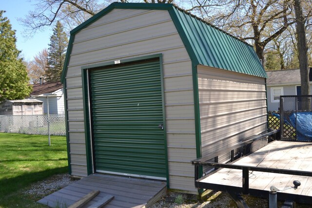 view of outdoor structure with a yard