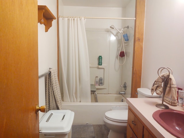 full bathroom featuring hardwood / wood-style flooring, toilet, shower / bath combination with curtain, and vanity