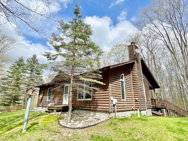 view of home's exterior featuring a yard