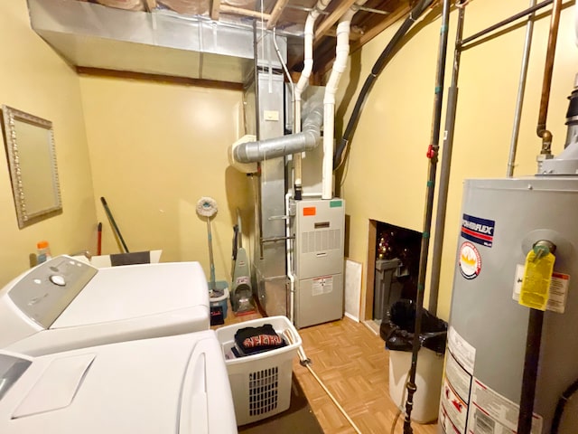 washroom with heating utilities, separate washer and dryer, light parquet flooring, and gas water heater