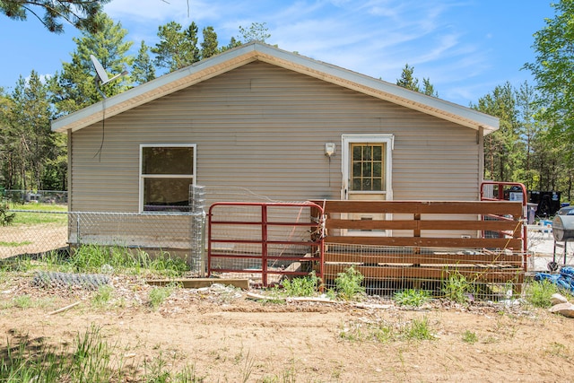 view of home's exterior with a wooden deck