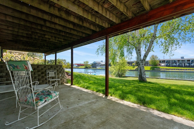 view of patio / terrace with a water view