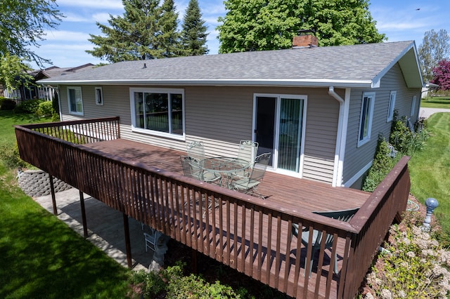 rear view of house with a wooden deck