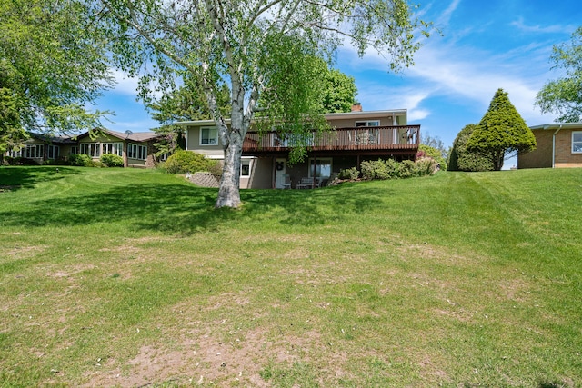 view of yard featuring a deck