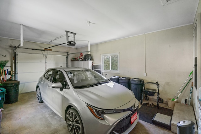 garage featuring a garage door opener