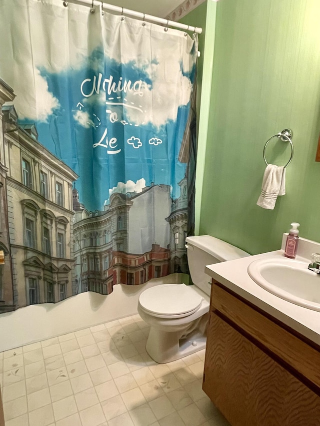 bathroom with vanity and toilet